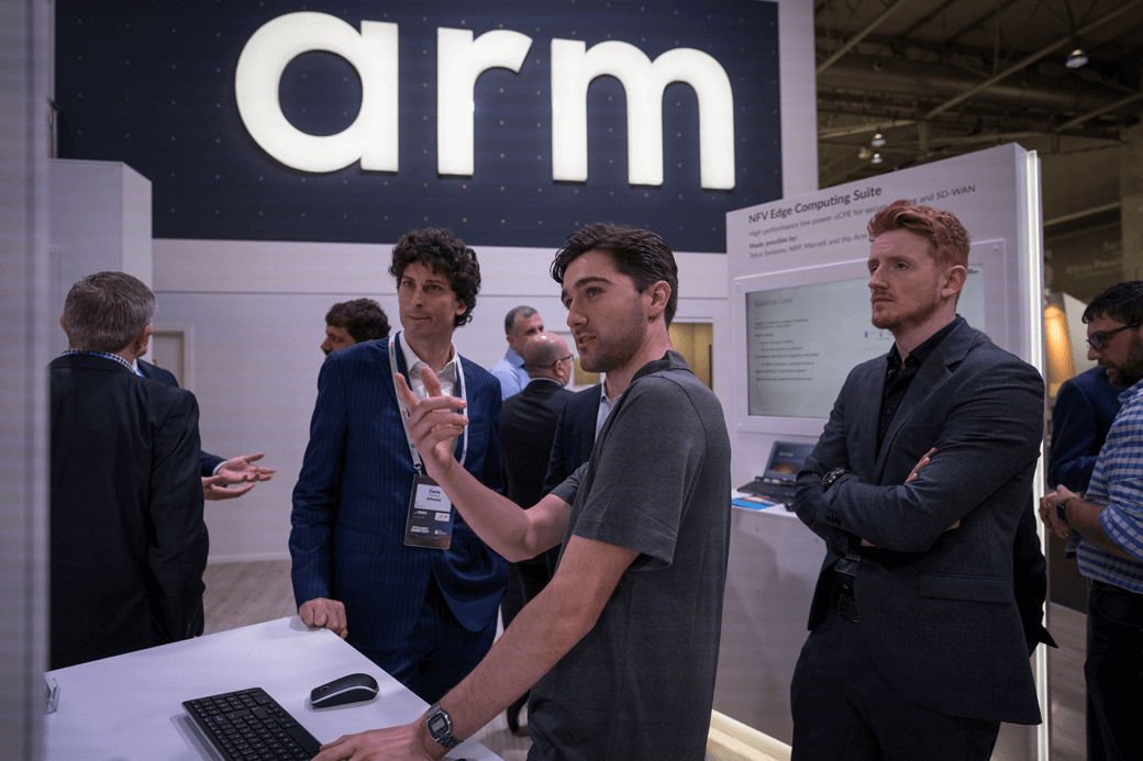 Arm employee talking at Arm booth MWC 2019