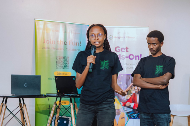  A picture of students presenting at the hackathon.