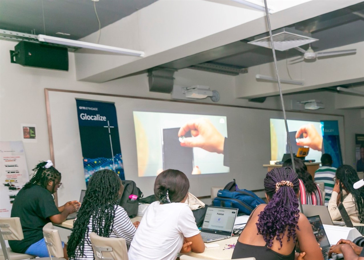  Speakers watch the presentation for Glocalize.