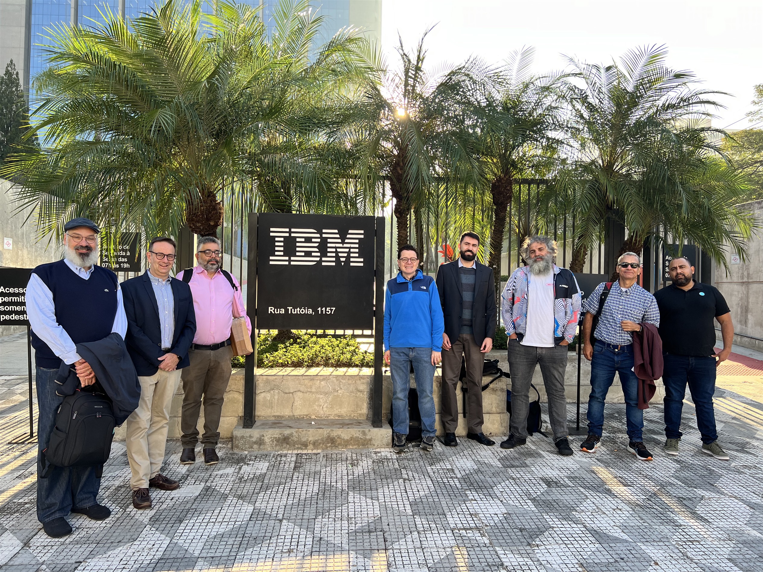 Photo of the team outside of IBM infront of the IBM sign