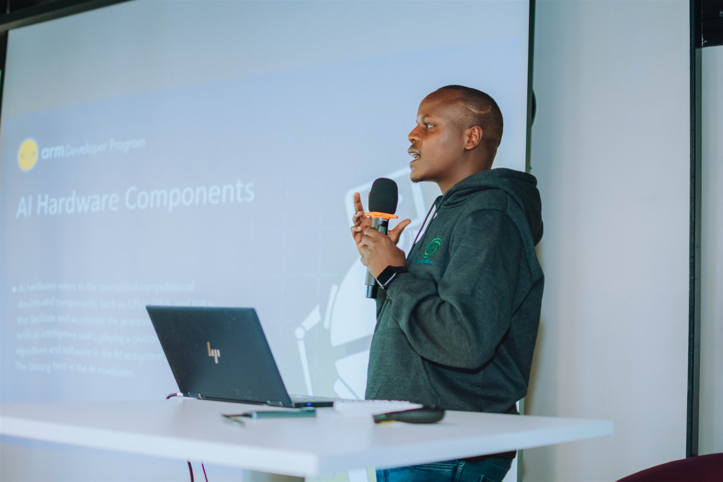 Kevin Odero speaking on stage about AI hardware components