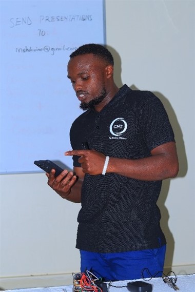 A picture of the presenter of Smart Automotive Security.